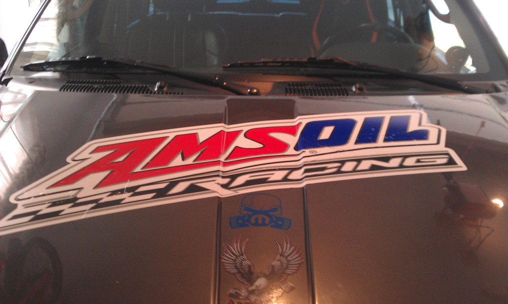 Big Amsoil Sticker on Jeep